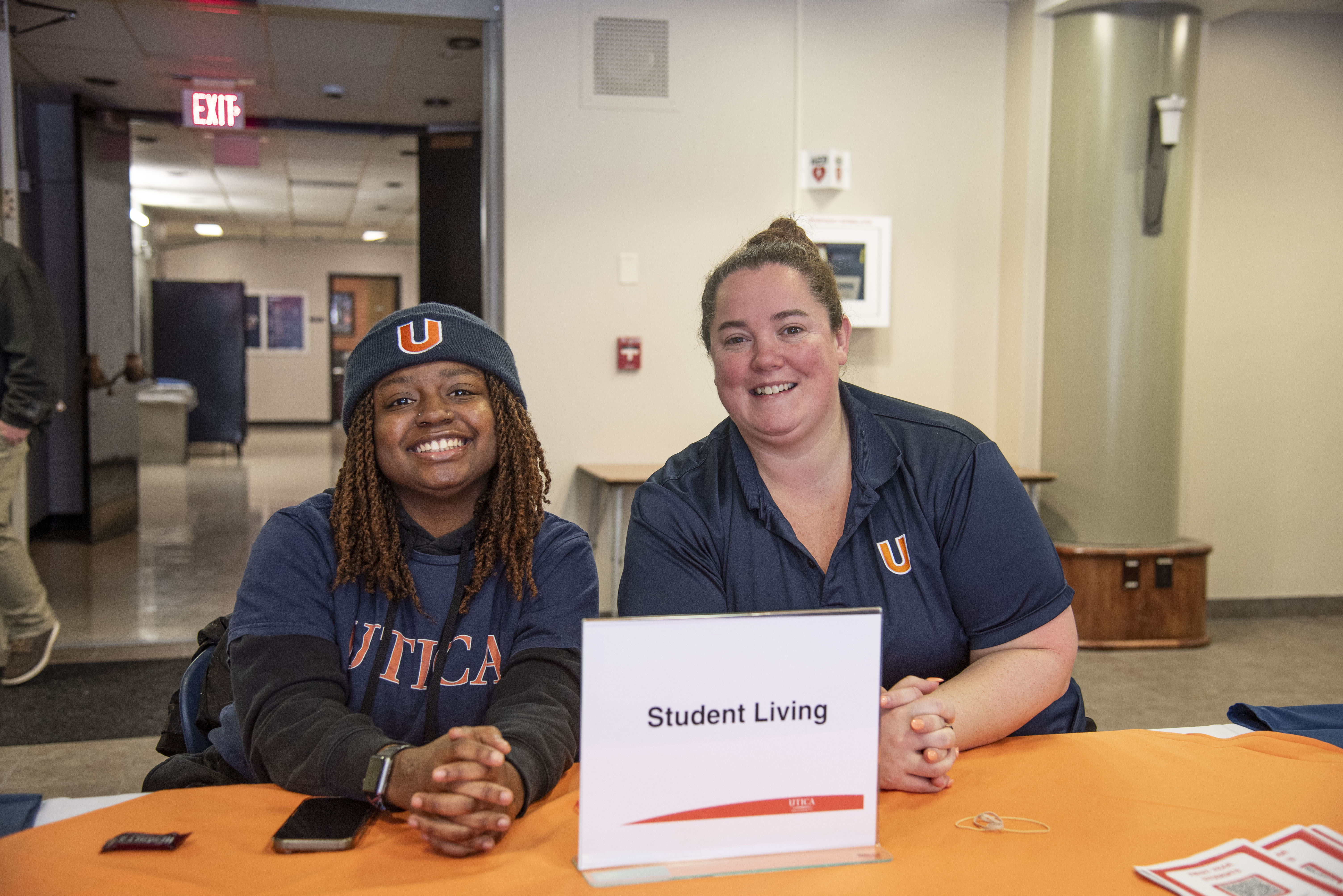 Members of Student Living get ready to greet students at a November 2025 Open House event.
